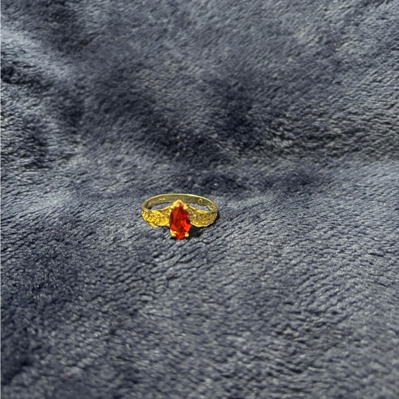 Elegant Gold Ring with Red Gemstone 14k